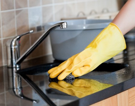 Office cleaner working in a Bermondsey business workspace