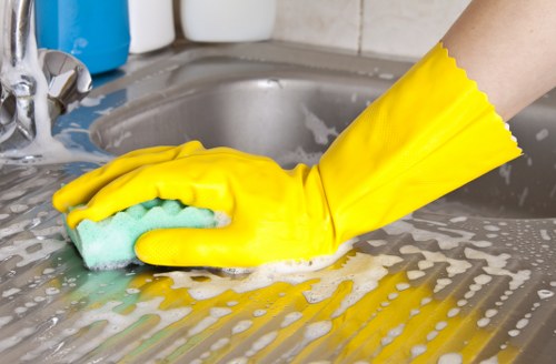 Cleaning specialist in Bermondsey working on a tidy living space