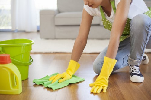 Professional cleaning team reviewing safety steps in Bermondsey